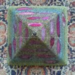 Pyramid Orgonite Purple Rain, is a beeswax pyramid orgonite, with hyalin quartz, agatas, and other minerals, metals and other materials
