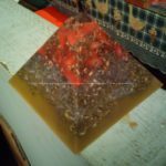 pyramid orgonite in beeswax, with huge crystal and shungite, flowers