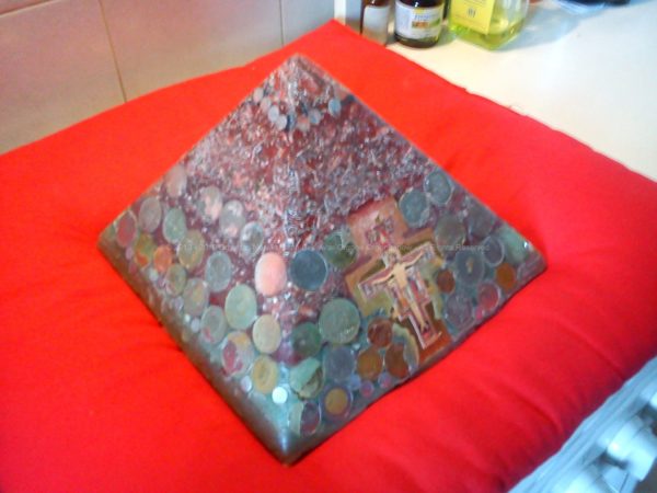 Pyramid orgonite Mea Culpa, with beeswax, metals, ancient and legal coins, Laser quartz, black tormalin, and a crucifix