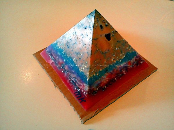 Orgonite pyramid 17 Spring, beeswax minerals and metals