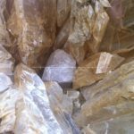Crystal Cave Pyramid Orgonite 24 cm, beeswax and metals, quartz and selenit as rain, huge hematite inside