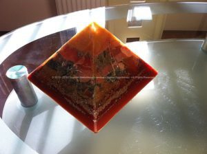 Crystal Cave Pyramid Orgonite 24 cm, beeswax and metals, quartz and selenit as rain, huge hematite inside