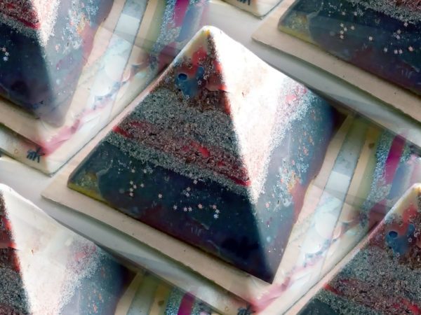 Phoenix 24 cm pyramid orgonite, beeswax minerals and crystals, metals and other materials.