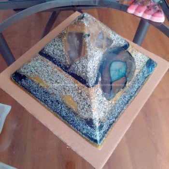 Black Celebration 24 cm pyramid orgonite, Rock crystal, smokey quartz, agata, rose quartz, fluorit, other minerals, beeswax and metals.