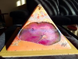 Ciao 24 cm pyramid orgonite, rock quartz, shungite, blaclk tourmaline, beeswax metals and agate.