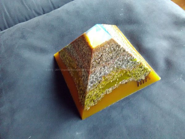 Adriatico, 12 cm pyramid orgonite done with an opalite pyramid, blue apatite beeswax and metals, plus one piece of shungite under the pyramid.